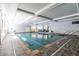 Indoor pool with tile flooring and ample natural light at 1800 Clairmont Lk # A226, Decatur, GA 30033