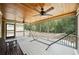Relaxing screened porch features a wood ceiling, bench seating, and a hammock for outdoor lounging at 212 Wilshire Ter, White, GA 30184