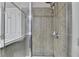 Stylish bathroom featuring a tiled shower, vanity, and modern fixtures at 5207 Merrimont Dr, Alpharetta, GA 30022