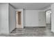 A bedroom featuring multiple doors and hardwood style floors at 5207 Merrimont Dr, Alpharetta, GA 30022