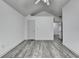 Bright bedroom features gray flooring and a vaulted ceiling at 5207 Merrimont Dr, Alpharetta, GA 30022