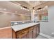 Open kitchen featuring granite counters, mosaic backsplash, and stainless hardware at 5207 Merrimont Dr, Alpharetta, GA 30022