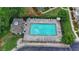 View of a community pool with lounge chairs and a gazebo at 5207 Merrimont Dr, Alpharetta, GA 30022