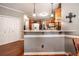 Bright kitchen with granite counters, pendant lighting, and stainless steel appliances offers modern style at , Lilburn, GA 30047