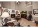 Open living room featuring a fireplace, built-ins, a vaulted ceiling, and a view to the second floor at , Lilburn, GA 30047