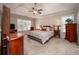 Spacious main bedroom with trey ceiling and neutral color palette at , Lilburn, GA 30047