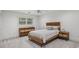 Bedroom featuring carpeted floors, a dresser, and natural light at 119 Kennemer Ct, Duluth, GA 30097