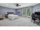 Serene bedroom with large windows, soft carpeting, and a comfortable bed, offering a relaxing retreat at 119 Kennemer Ct, Duluth, GA 30097