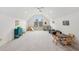 Spacious bonus room with vaulted ceilings, large windows, and a playful atmosphere at 119 Kennemer Ct, Duluth, GA 30097