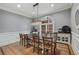 Charming dining room featuring a decorative light fixture and a table for six at 119 Kennemer Ct, Duluth, GA 30097