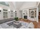 Comfortable and inviting living room showcasing a fireplace and built-in bookshelves at 119 Kennemer Ct, Duluth, GA 30097