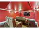 Movie room with theatre seating, large screen TV and dark hardwood flooring at 119 Kennemer Ct, Duluth, GA 30097