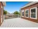 Back deck area on a brick house with a clear blue sky at 2260 Burlington Ln, Snellville, GA 30078