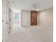 Bedroom featuring neutral carpeting, a brick accent wall, and an overhead fan at 2260 Burlington Ln, Snellville, GA 30078
