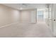 Spacious bedroom features neutral carpeting, a ceiling fan, and multiple doorways at 2260 Burlington Ln, Snellville, GA 30078