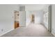 Light-filled bedroom with neutral carpet and paint creates a serene and inviting space at 2260 Burlington Ln, Snellville, GA 30078