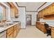 Cozy kitchen with wooden cabinets, granite countertops, and stainless steel appliances at 2260 Burlington Ln, Snellville, GA 30078