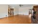 Bright living room featuring hardwood floors, fireplace, and direct access to the entryway and dining room at 2260 Burlington Ln, Snellville, GA 30078