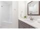 Clean bathroom with a tub and shower combination, white subway tile, and a modern vanity at 2700 Pine Tree Ne Rd # 2201, Atlanta, GA 30324