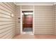 Building elevator with a painted interior wall with a framed picture beside the elevator door at 2700 Pine Tree Ne Rd # 2201, Atlanta, GA 30324