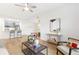 Bright, open living room featuring modern furniture, an island kitchen bar, and natural light at 2700 Pine Tree Ne Rd # 2201, Atlanta, GA 30324