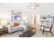 Inviting living room with modern furnishings and an open layout connecting to the kitchen at 2700 Pine Tree Ne Rd # 2201, Atlanta, GA 30324