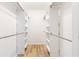 Spacious walk-in closet with adjustable shelves and rods for organization at 2700 Pine Tree Ne Rd # 2201, Atlanta, GA 30324