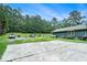 Spacious backyard with a concrete patio and wooded area at 2969 White Ne Rd, Conyers, GA 30012