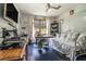 Bright bedroom features a mounted television, large window, and single bed at 2969 White Ne Rd, Conyers, GA 30012