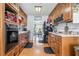 Traditional kitchen featuring warm wood cabinets and natural light at 2969 White Ne Rd, Conyers, GA 30012