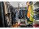 Walk-in closet with clothing rods, shelving and storage solutions at 2969 White Ne Rd, Conyers, GA 30012