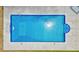 Aerial view of a sparkling blue inground pool surrounded by a concrete patio at 326 Seldom Seen Trl, Canton, GA 30115