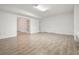 Large basement with tiled floors and lots of space for entertaining or recreation at 326 Seldom Seen Trl, Canton, GA 30115