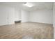 Basement area with neutral colors, ceramic tile floors, recessed lighting and built in bench seating at 326 Seldom Seen Trl, Canton, GA 30115
