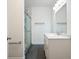 Updated bathroom with marble countertops, updated fixtures, and a glass shower at 326 Seldom Seen Trl, Canton, GA 30115