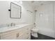 Bathroom featuring a white vanity with marble countertop and subway tile shower at 326 Seldom Seen Trl, Canton, GA 30115