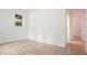 Bedroom with neutral colors, tiled floors, a window and access to another room at 326 Seldom Seen Trl, Canton, GA 30115