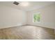 Bright bedroom with a large window and tiled floor that provides a serene space at 326 Seldom Seen Trl, Canton, GA 30115