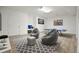 Basement game room with ping pong table, bean bag chairs, and fun decor at 326 Seldom Seen Trl, Canton, GA 30115