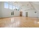 Bright and open living space with high ceilings, hardwood floors and large windows at 326 Seldom Seen Trl, Canton, GA 30115