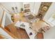 Aerial view of living area featuring fireplace, kitchen island, and access to the backyard at 326 Seldom Seen Trl, Canton, GA 30115