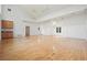 Spacious living room with hardwood floors, natural light and tall ceilings and a convenient wet bar at 326 Seldom Seen Trl, Canton, GA 30115