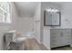 Clean bathroom featuring a shower-tub combo, vanity with ample storage, and a neutral color scheme at 19 Willowbrook Ct, Acworth, GA 30101