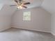 Neutral bedroom featuring plush carpeting, a ceiling fan, and a window with outside views at 19 Willowbrook Ct, Acworth, GA 30101