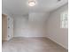 Well-lit bedroom offers neutral walls and carpet, plus a window at 19 Willowbrook Ct, Acworth, GA 30101
