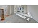 Bright living room boasts a large bay window and plush gray carpet flooring at 1924 Wilkenson Xing, Marietta, GA 30066