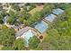 Aerial image showcasing the community pool and tennis courts, surrounded by lush greenery, perfect for outdoor recreation at 3638 Sope Creek Farm Se, Marietta, GA 30067