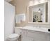 Bathroom features a granite vanity, a toilet and a shower with a white shower curtain at 3638 Sope Creek Farm Se, Marietta, GA 30067