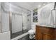 Modern bathroom features a glass-enclosed shower, a vanity and tasteful decor at 3638 Sope Creek Farm Se, Marietta, GA 30067