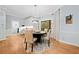 Bright dining area features hardwood floors, large windows, neutral paint and a modern light fixture at 3638 Sope Creek Farm Se, Marietta, GA 30067